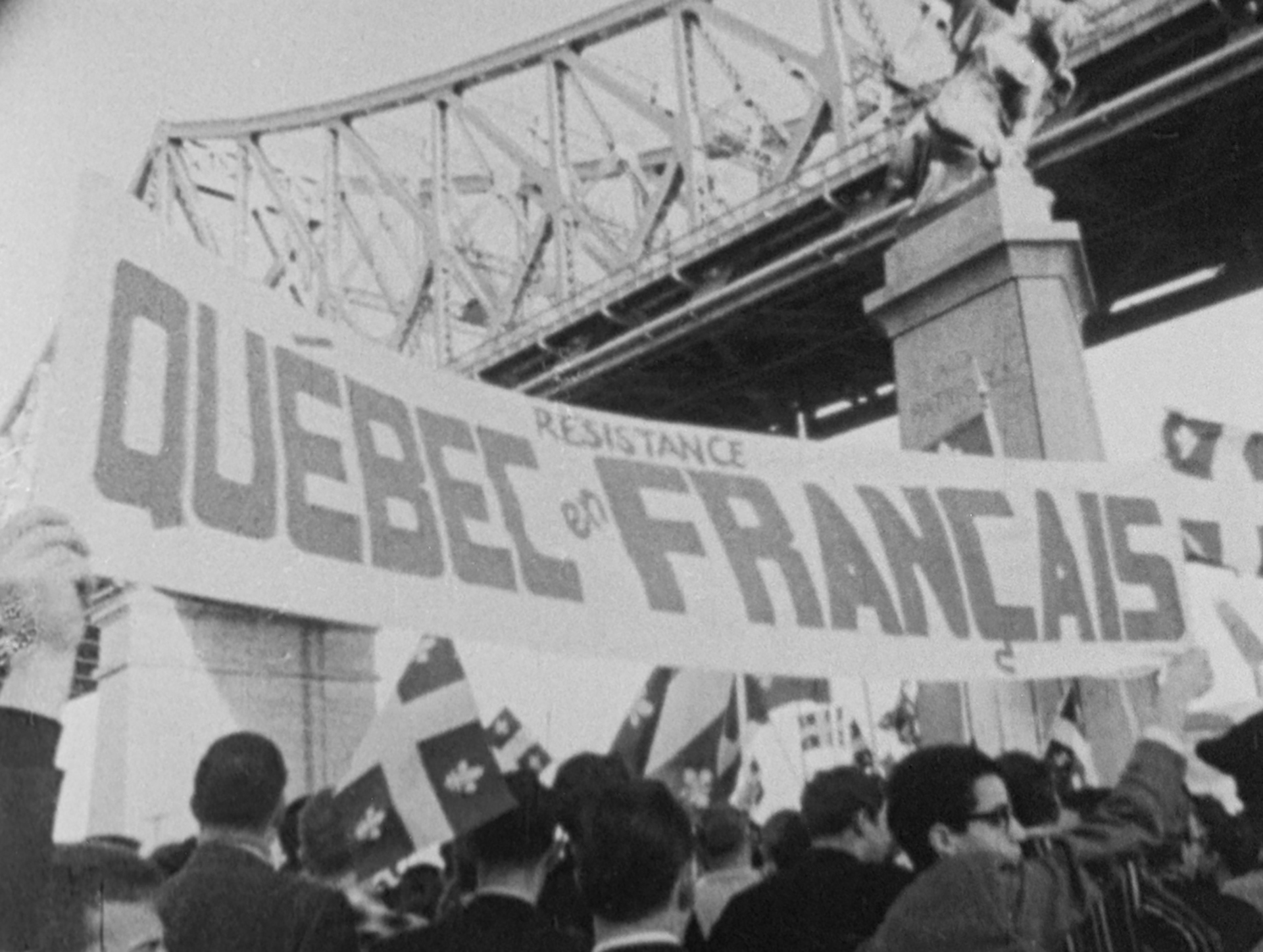 Quebec enforces laws to protect the French language, 1977